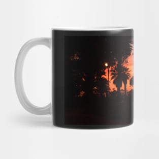 Palm trees silhouette at sunset Mug